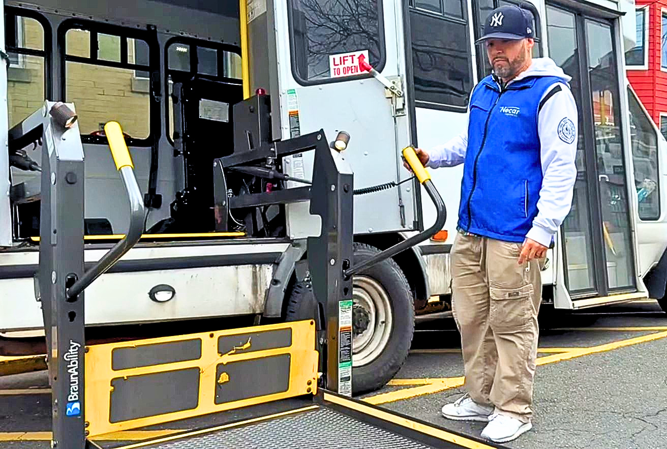 La Necar wheelchair accessible van with ramp deployed for boarding